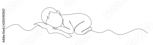 Fotografija This image shows a minimalist continuous one-line drawing of a baby lying on their stomach, conveying a sense of innocence and gentle movement