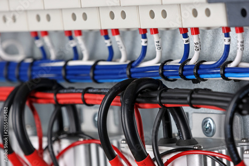 Connecting electrical modules using copper insulated electrical wires in the electrical switchboard. 