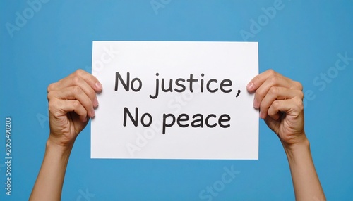 Hands Holding 'No justice, No peace' Protest Sign on Blue Background