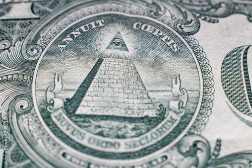 Close-up of the Eye of Providence and Pyramid on a US One Dollar Bill