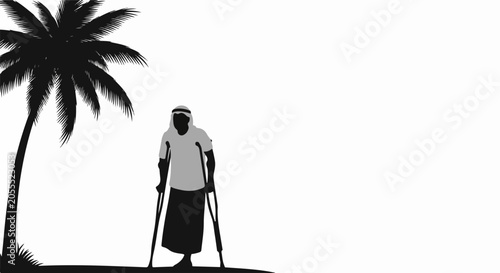 man with crutches under palm tree