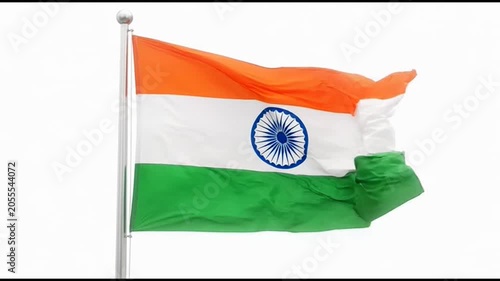 Indian national flag waving proudly against a clear white sky close-up tricolor