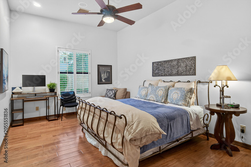 Принти на полотні Cozy bedroom with queen bed and workspace