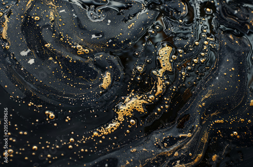 Photo of Bubbly crude oil in dark pond. Background texture for backdrops or mapping