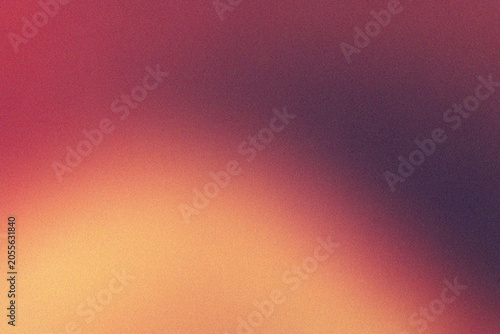 Abstract blurred background with soft orange and purple gradient colors
