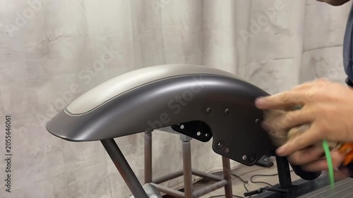 Repairing and painting motorcycle details