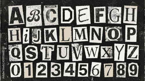 Alphabet and numbers cutout collage from magazine snippets on a dark textured background