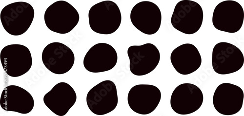 Foto Collection of black organic blob shapes on white background