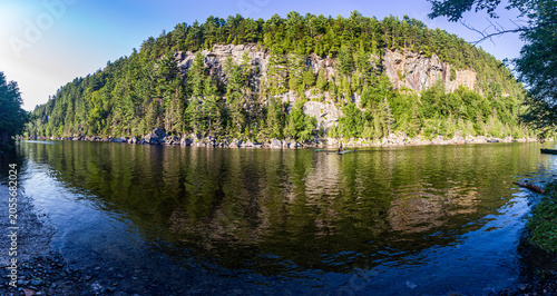 Granite Cliff Reflected in Calm Lake with Kayaker, Lac Long, Quebec