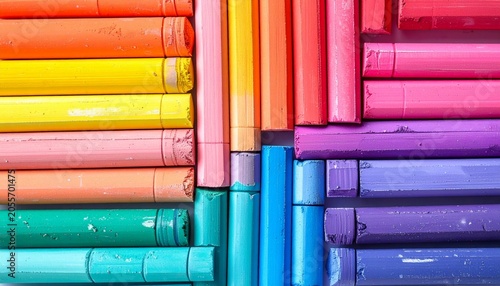 A vibrant and colorful collection of art pastels neatly arranged in a spectrum of hues, showcasing the artist's palette and creative possibilities