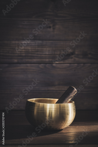 A calming wellness scene featuring a singing bowl
