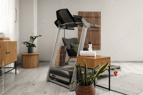 Modern home gym interior wi...