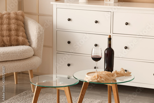 Red wine bottle and glass o...