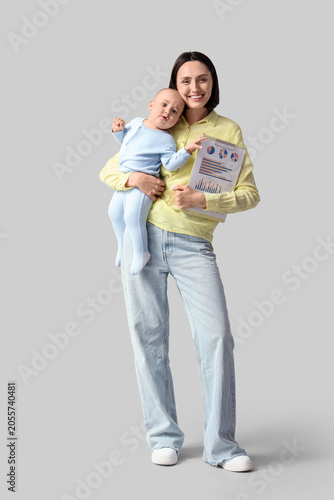 Working mother with her bab...
