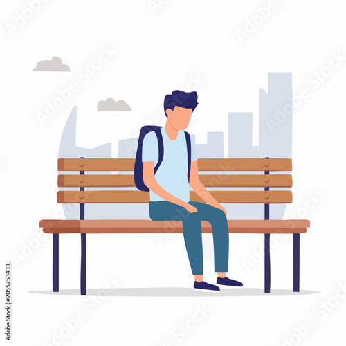 Young man with backpack sitting alone on a park bench in a city