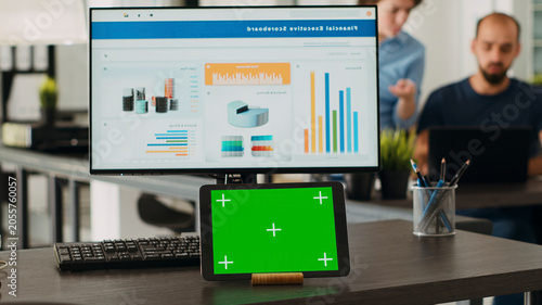 Konstfotografi Workstation with green screen on tablet device in collaborative workspace for creative firm
