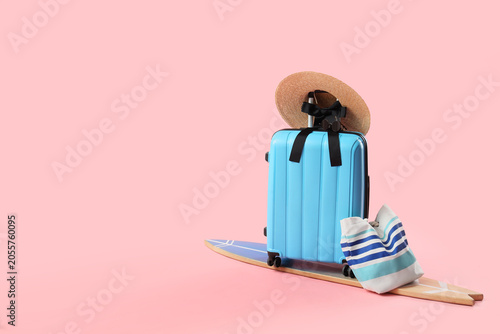 Blue travel suitcase with s...