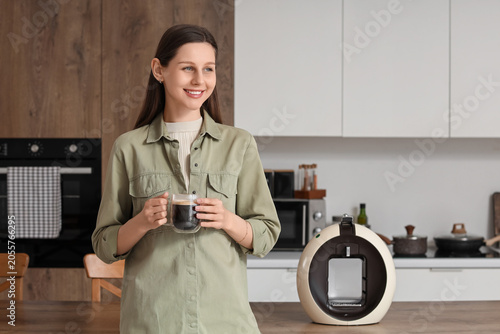 Smiling young woman enjoyin...