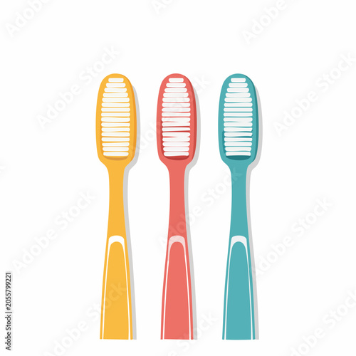Three colorful toothbrushes