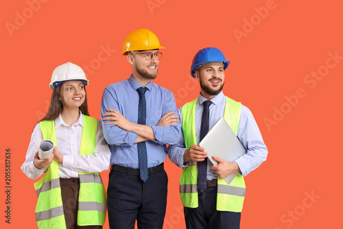 Group of engineers with lap...
