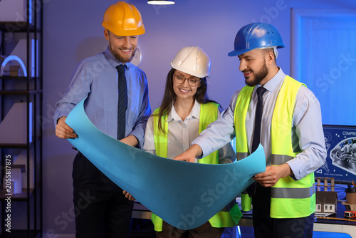Group of engineers working ...