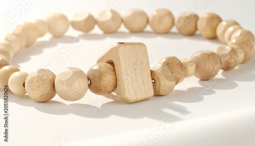 Wooden Bead Bracelet: A handcrafted wooden bead bracelet with a unique clasp, showcasing natural texture and minimalist design, perfect for everyday wear or as a thoughtful gift.