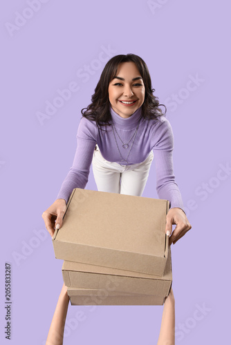 Beautiful woman taking shoe...