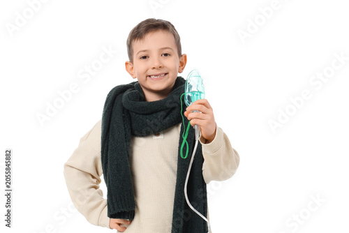 Ill little boy with nebuliz...