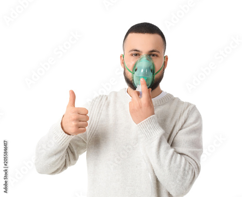 Young man with nebulizer sh...