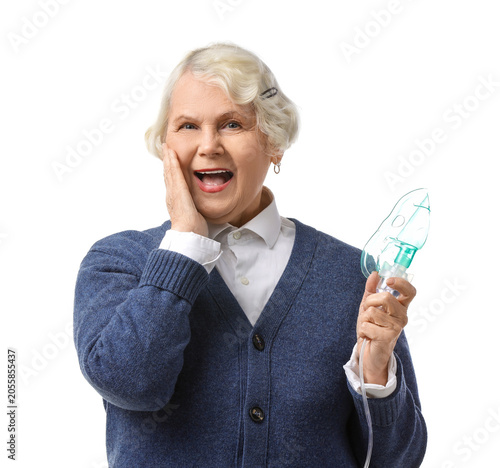 Surprised senior woman with...