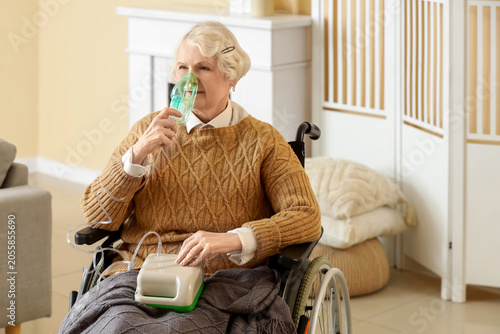 Senior woman in wheelchair ...