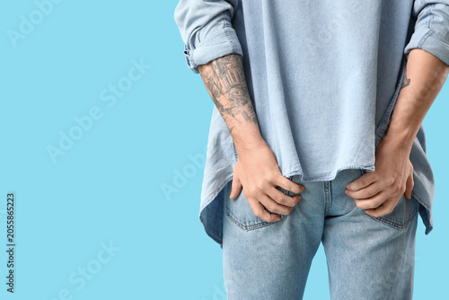 Man with hemorrhoids or itc...