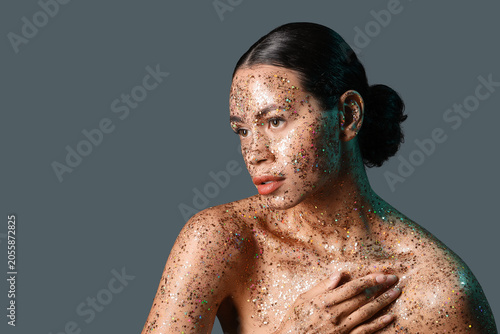 Glamorous woman with glitte...