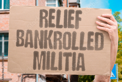 Foto "Relief bankrolled militia" Aid funded paramilitary group