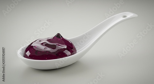 Glossy Purple Jam on White Spoon