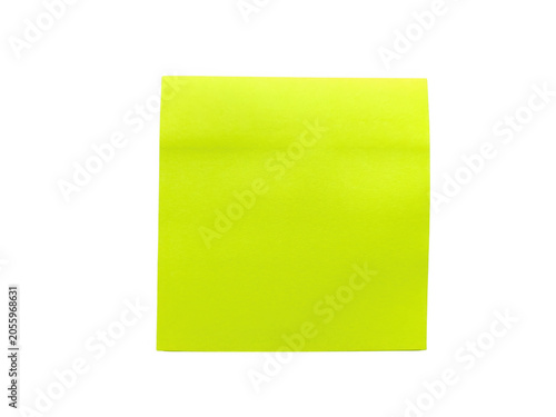 Bright yellow sticky note on desk