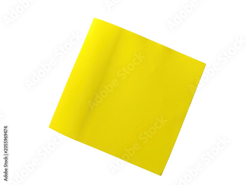 Bright yellow origami paper folded in corner