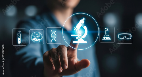 Scientist using a futuristic digital interface to analyze medical research and biotechnology laboratory icons for scientific discovery