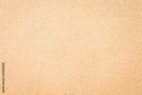 Brown kraft paper texture background, recycled paper sheet for design.