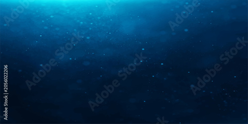 Fotografie Deep blue ocean water with tiny bubbles rising towards the surface, creating a serene and mysterious underwater ambiance
