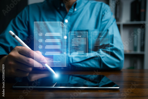 contract paperwork, signs,Business professional signing electronic documents on a tablet with digital contract interface, document approval, workflow automation, compliance, and paperless operations.
