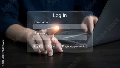 Person typing login credentials on digital interface with glowing username and password fields