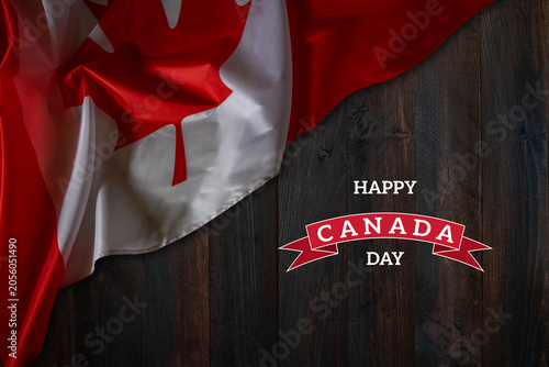 Wallpaper with waving National flag of Canada on wooden board