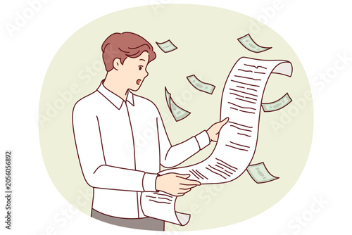 Φωτογραφία Tax burden and bill from federal government shocks man who opens mouth after reading letter from tax inspector
