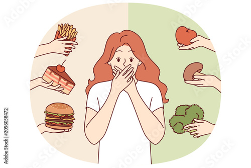 Vászonkép Choice between healthy and unhealthy food frightens woman, who unable to decide and create diet