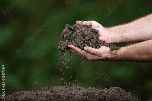 Tableau sur toile Soil closeup features dirty hands