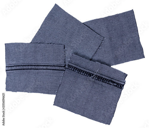 Isolated denim scraps of fabric with copyspace on white background