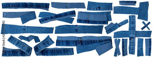 Isolated collection of denim scraps of fabric with copyspace on white background	