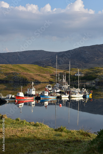 Moored Boats in Scottish Highland Bay with Rolling Hills