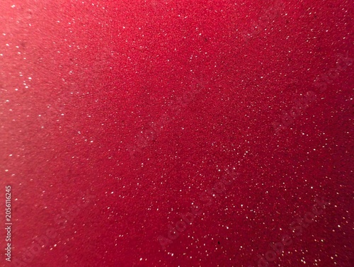 Shimmering red glitter background, with sparkling texture
